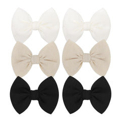 ONENINEDREAM baby bows clip front view in black for easy everyday styling.