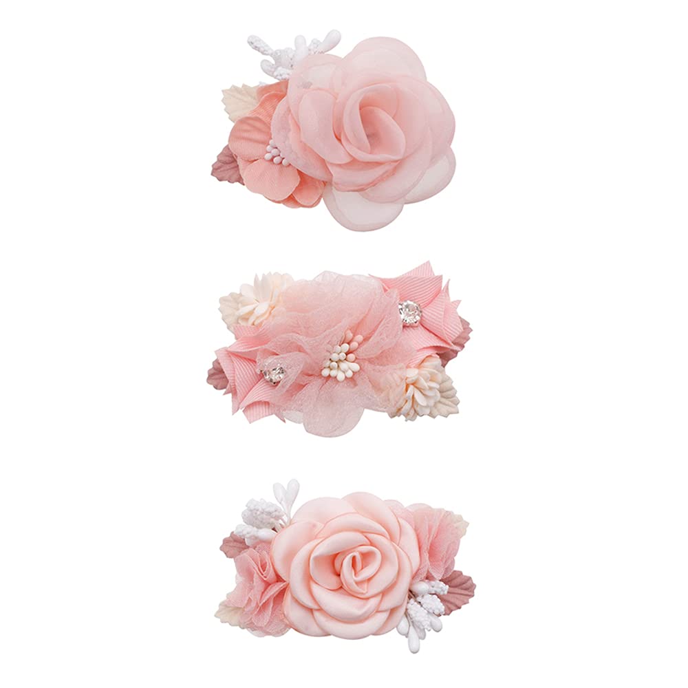 OOSAKU pink rose flower hair clip showing secure, gentle hold for delicate baby hair
