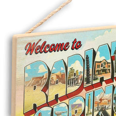 Open Road Brands rope-hanger wood sign offers easy, tidy wall display