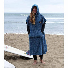 Open Road Goods poncho pocket close-up demonstrating secure zippered storage during beach changes.