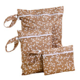 Opgroeie wet bags large zippered pocket keeps diapers organized on the go.