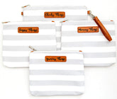 Orange Blossom XL pouches with gray stripes and leather labels for quick organization