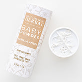 Ora's Amazing Herbal Baby Powder Vanilla Amber tub with soft texture for gentle daily use.