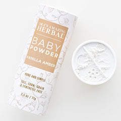 Ora's Amazing Herbal Baby Powder Vanilla Amber tub with soft texture for gentle daily use.