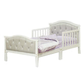 Orbelle Gray padded toddler bed frame view, showcasing sturdy solid-wood construction for safe sleep.