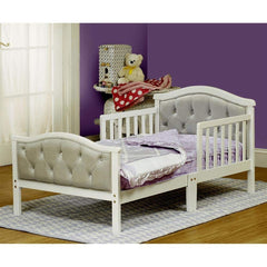 Orbelle Gray padded headboard with crystal-like buttons, adding whimsy and elegance.