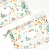 Orchid Hearts compact wipes dispenser for on-the-go diaper bag needs.