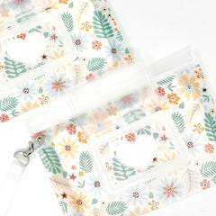 Orchid Hearts compact wipes dispenser for on-the-go diaper bag needs.