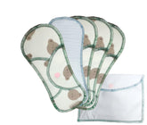Organic cotton pads laid out to show multi-layer absorbency for daytime protection.