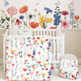 Oudain Spring Flower crib skirt adds cohesive decor to the nursery.