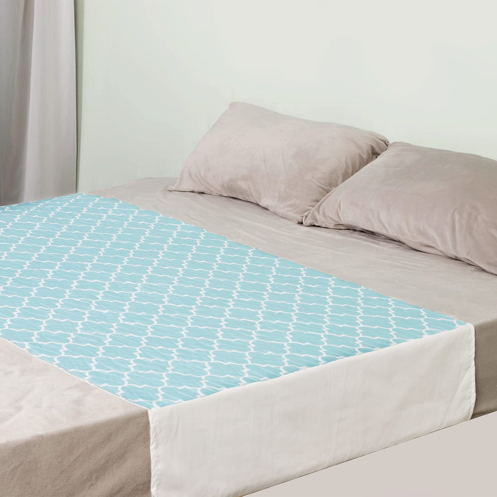 OUTCREATOR Saddle Style Bed Pad left view shows secure tuck-in wings for reliable protection.