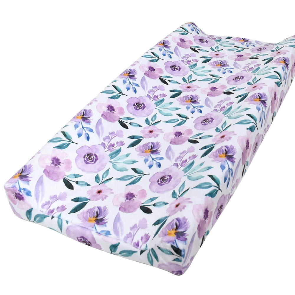 Owlowla soft minky changing pad cover in purple floral for gentle infant comfort.