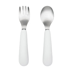 OXO Tot Training Fork & Spoon Set pink in hand demonstrating easy self-feeding
