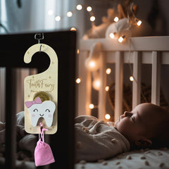 Pink PAMBO door hanger showing coin symbols for tooth rewards