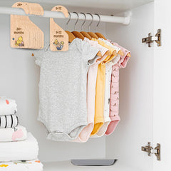 PAMBO Winnie Bear wooden hanger provides a smooth burr-free surface for baby clothes.