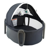 Pamo Babe Portable Bassinet Dome creating a cozy sleep space on the go.