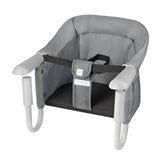 PandaEar Hook-On High Chair attached to a table for secure, family-friendly dining.
