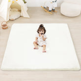 PaPaMat ivory baby play mat on the floor for tummy time and crawling