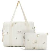 Paterr quilted diaper bag tote with olive flower design for stylish outings.
