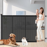 Pawtners 51-inch extra tall gate protecting doorway for jumpers.