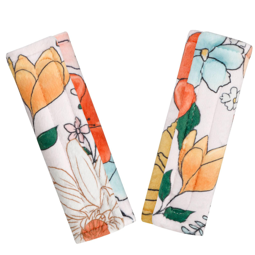 Pea Pod two-pack strap covers for car seats protect delicate skin
