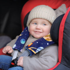 Pea Pod velcro-closure seat belt pad for quick, adjustable fit.