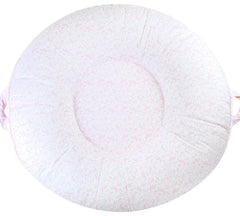 Pello multi-use baby floor pillow with soft center and raised sides for secure lounging