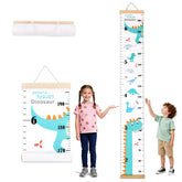 Penitue blue dinosaur growth chart on wall for tracking height milestones.