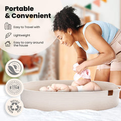 Perabella changing basket with handles, easy to carry between rooms.