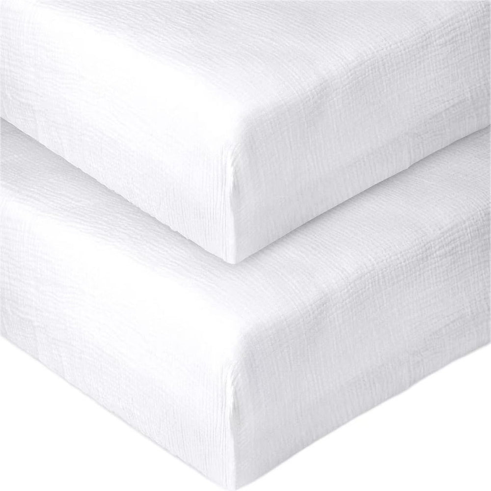 Pet Rejoir white muslin fitted crib sheet offers a soft, breathable sleep surface.