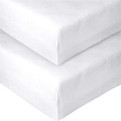 Pet Rejoir white muslin fitted crib sheet offers a soft, breathable sleep surface.