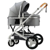PetitX convertible stroller with grey frame offers smooth steering on urban streets.