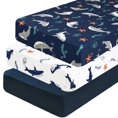 PHF shark crib sheet showing a snug 28x52 fit for standard cribs.