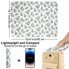 PHOEBUS BABY changing pad double-sided design ready for quick flips.