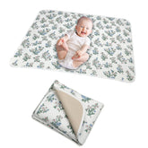 PHOEBUS BABY changing pad front muslin side for soft, breathable skin contact.
