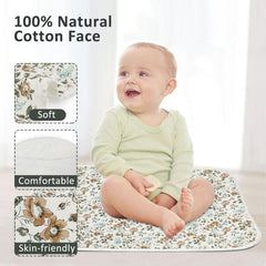 Phoebus Baby blue flower changing pad close-up showing leak-proof design