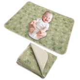 PHOEBUS BABY double-sided changing pad offers soft muslin top and easy-clean leather back.