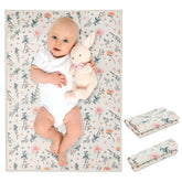 Phoebus Baby vegan leather changing mat, floral design, open for quick diaper changes.