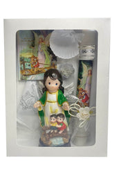 Pink Princess baptism candle set with angel statue on a bridge enhances ceremony ambiance.