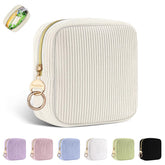 Playexen Period Bag in corduroy beige provides discreet, portable napkin and tampon storage.
