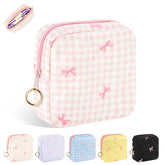 Playexen plaid pink period bag close-up of soft quilted fabric for discreet storage.