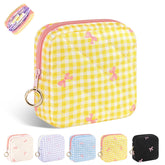 Playexen period bag plaid yellow front view, compact to fit in a purse for discreet storage.