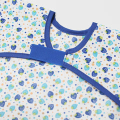 Plie baby smock with soft neckline and elastic cuffs for comfortable wear.
