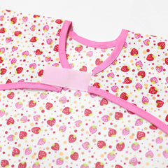 Plie bib waterproof fabric surface demonstrated during toddler feeding for easy cleaning.