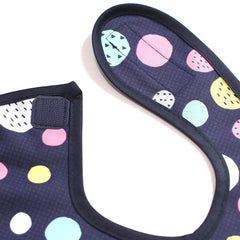 Plie waterproof bib side angle shows extra-long protection from spills.