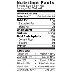 Close-up of ingredients reveals blueberry, carrot, and whole grains for kids.