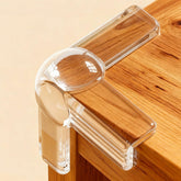 PlusOxsteel table corner protector 12-pack on a sharp edge provides soft cushioning for infants
