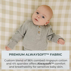 Pobibaby elastic-fit changing pad cover, close-up showing secure wrap around the pad.