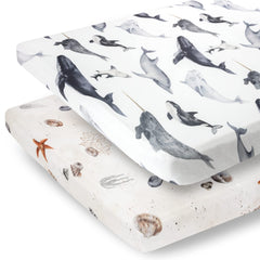 Pobibaby ocean pattern n-play sheet on mattress offers snug fit for safe sleep.