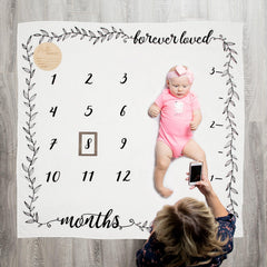 Pondering Pine boho garland design as a playful photo backdrop.